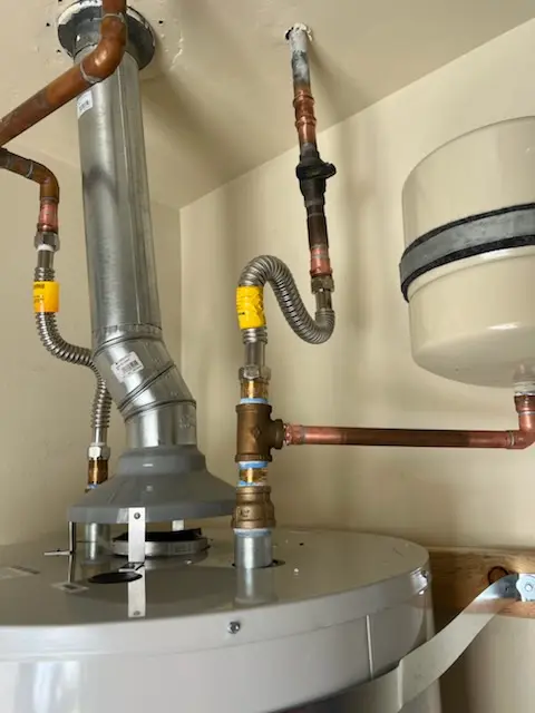 Water heater installation and plumbing repair in Broyhill Park